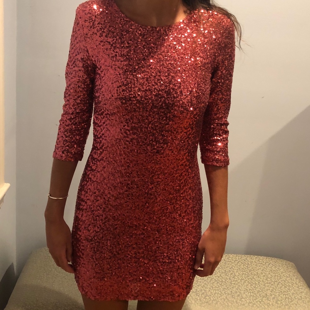 Very fun, pink sparkly, form fitting formal dress
